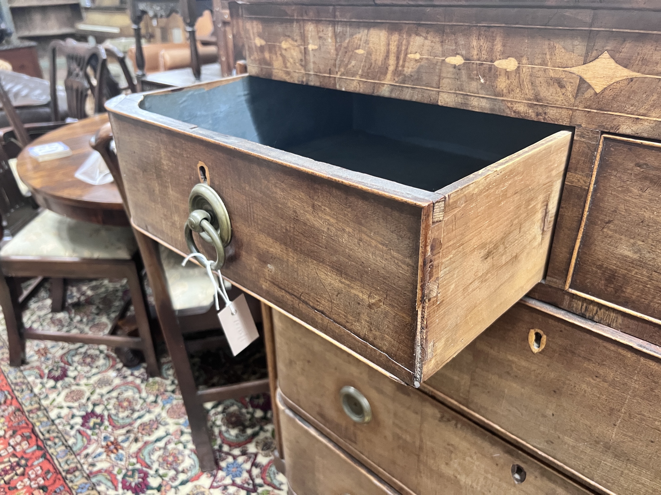 A Regency inlaid mahogany bow front chest, width 108cm, depth 48cm, height 115cm